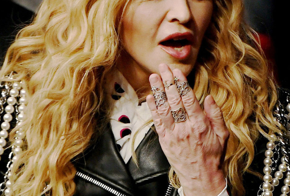 Madonna's young face vs aging hands